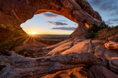 Located in Arches National Park, Utah and only 50 miles away from world-renowned Mesa Arch, Partition Arch provides a beauty all its own.   It's more challenging to reach than Mesa and you have to hike in the dark for an hour or so...but views like this are a sweet payback