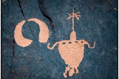 \"Calling All Ancient Alien Conspiracy Enthusiasts!\"  Back in the day, they must have had some wild hats and tunics because you can\'t look at some rock art without a sense of wonder.  This is one of the dozens of petroglyphs that adorn \'Newspaper Rock\' near Canyonlands NP.