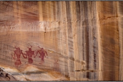 \"Ancient Guardians\" These Fremont pictographs are massive and dramatic.  They patiently tower over the stream that flows away from Calf Creek Falls as they have done for millennia.  Its interesting to note that the 3rd figure from the right apparently overpainted a smaller portrait.