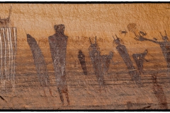 \"Magic Fingers\"  This is the right half of the \'Harvest Panel\' ...certainly one of the premier rock art sites in the country.  That figure on the far right with Indian Grass growing from his finger is the one that catches everyone\'s attention...how could it not?  The symbolism is palatable.The panel is in direct sunlight and has faded.  My processing has reversed that in this image so the original color and detail can be better appreciated. This image only captures half of the substantial panel but the detail