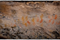 Helping Hands\"  Many consider Cave Springs to be one of the premier handprint pictographs.  The vibrant/varied colors and the use of \'stripes\' to make the prints certainly catch the eye. Surprisingly, although it is easily accessible it is also nearly free of graffiti and vandalism..