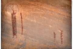 These figures are in an alcove high up on a cliff face and significantly faded.  D-Stretch restored many of the lost details as well as the sun-like symbol behind the head of the figure on the far left..  The elaborate headresses on enlongated bodies are striking. Old Woman Wash, Utah